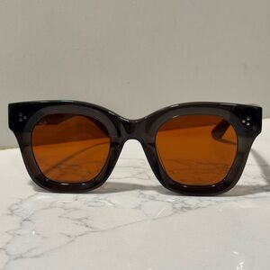 Stylish Black Sunglasses with Orange Lenses